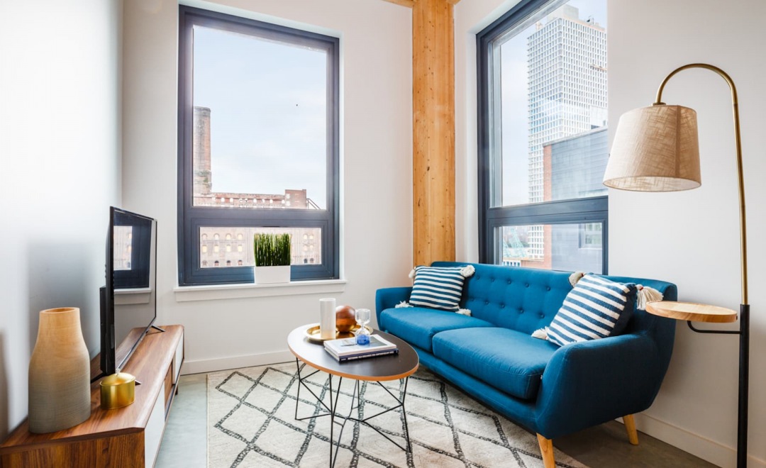 living room with wood-style flooring and bright spaces