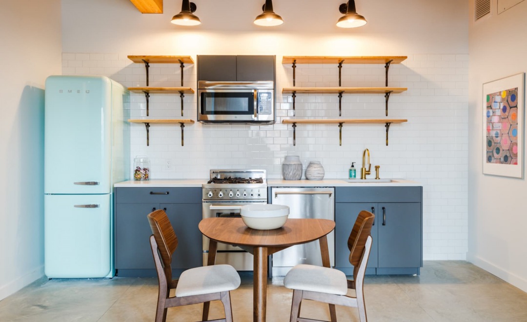 kitchen with colored fixtures and lighting