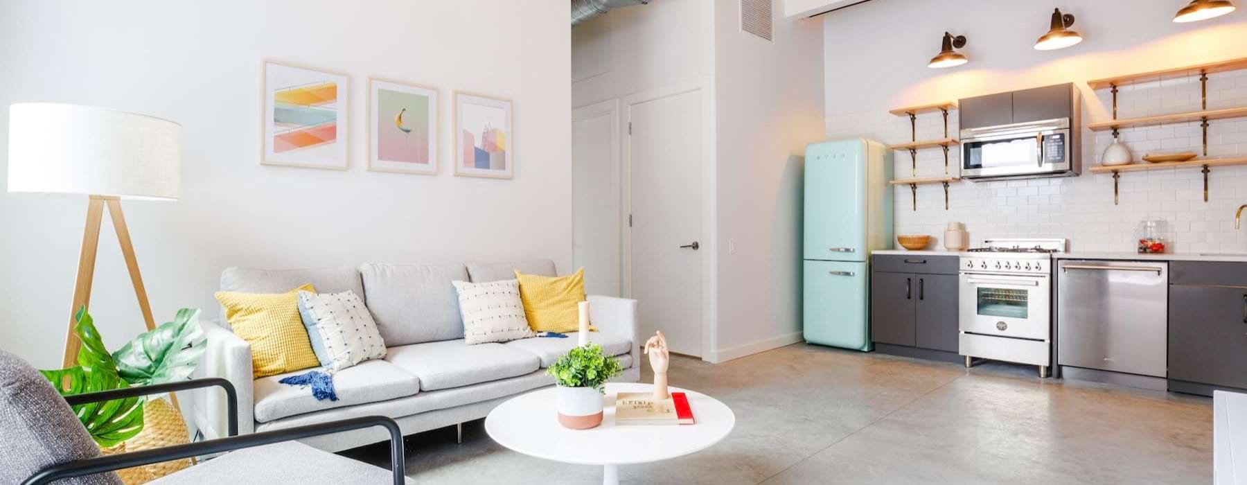 a living room with a couch and a table